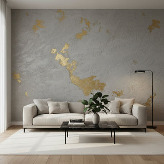 Textured gray wall with gold leaf design Marmorino and golden paint 