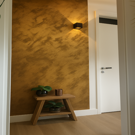 Narrow hallway with a wooden stool against a textured wall, featuring a light fixture.