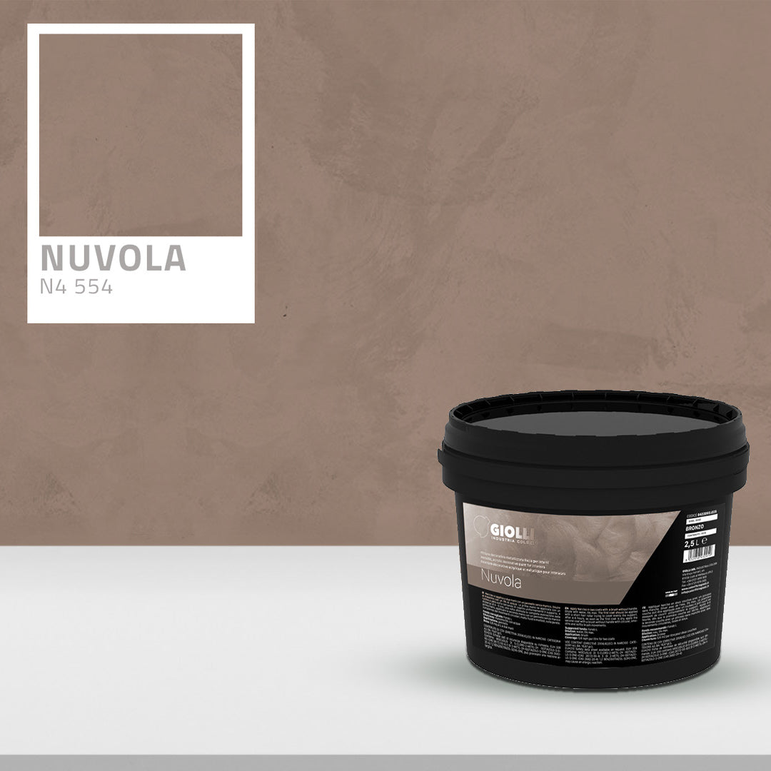 Black paint container labeled 'Nuvola' on a white surface with a brown wall background