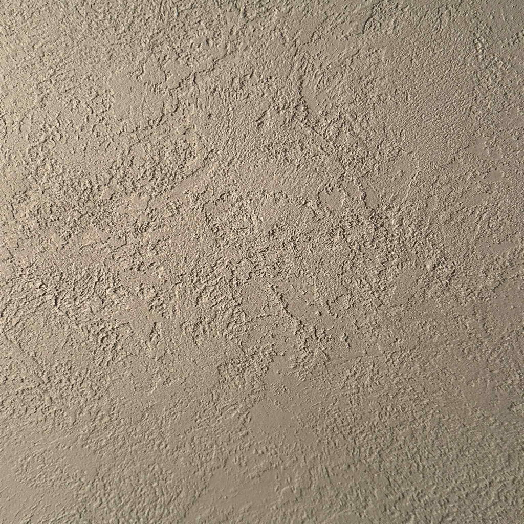 Textured beige wall paint Mammorino material 